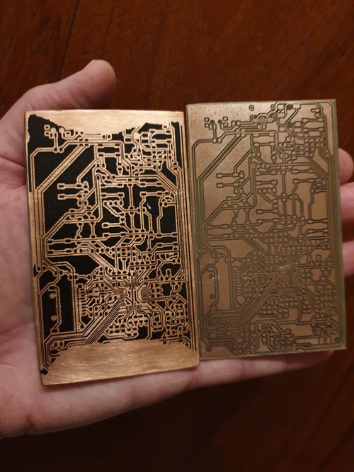 PCBs side-by-side - one with toner - the other etched